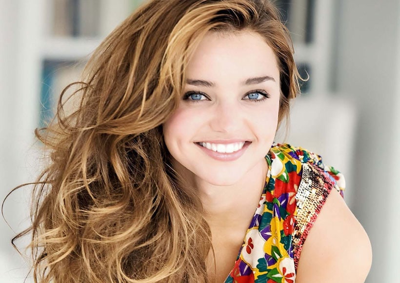 Woman with a bright, natural smile after cosmetic dentistry