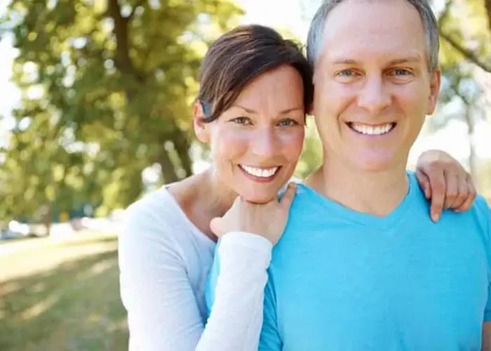 Smiling couple outdoors