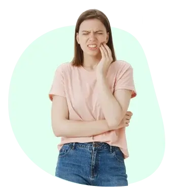 Woman touching her swollen jaw