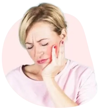 A woman suffering from tooth pain